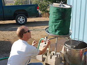 Using hydraulic pressure to squeeze the grapes.