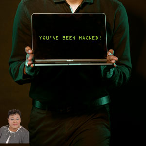 Sign saying "You've been hacked" with Brenda Bryant