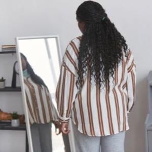 A woman struggling with body image.