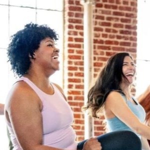 A group of people in a dance class together.