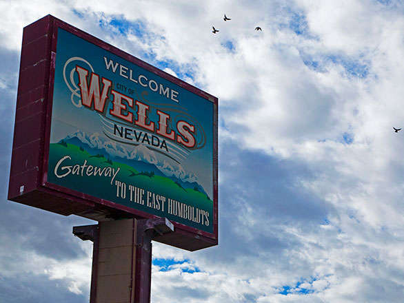 Wells road sign