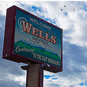 Wells road sign