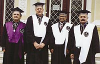 Deans David Thawley, middle left, and Rang Narayanan, middle right.