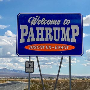Road sign that says "Welcome to Pahrump, discover and enjoy"