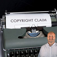 Typewriter with "Copyright Claim" on paper with Mike Bindrup