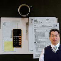 Tax forms, calculator and Juan Salas