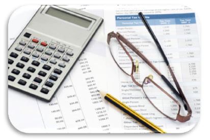 calculator, glasses, pencil on files