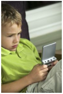 Boy with green shirt gaming
