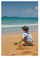 Boy playing with sand