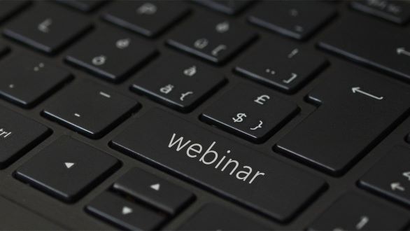 Keyboard with the word "webinar" on the shift key