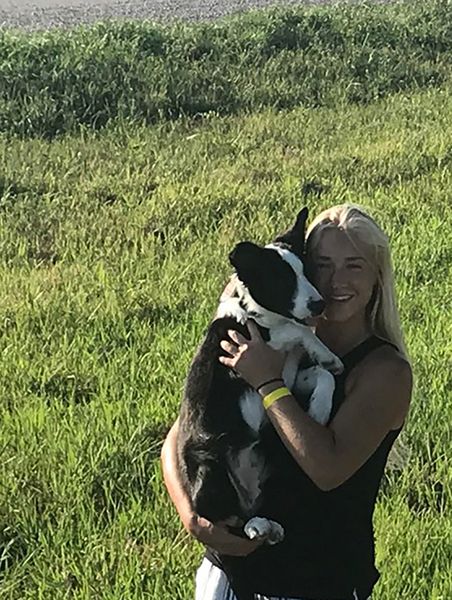 MacKenzie holding her dog