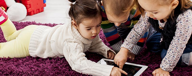 toddlers with tablet