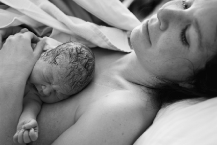 Mother holding infant