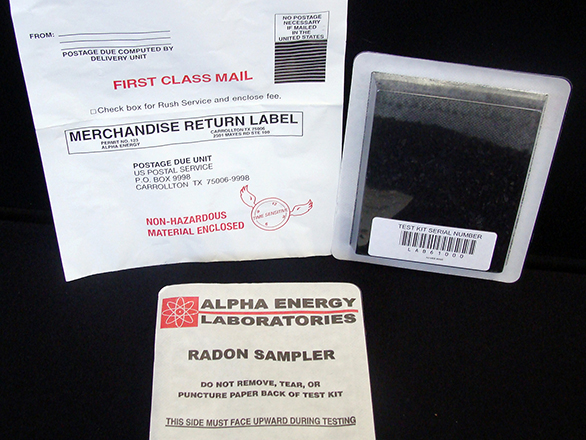Radon test kit and return address envelope.