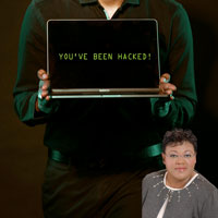 Sign saying "You've been hacked" with Brenda Bryant