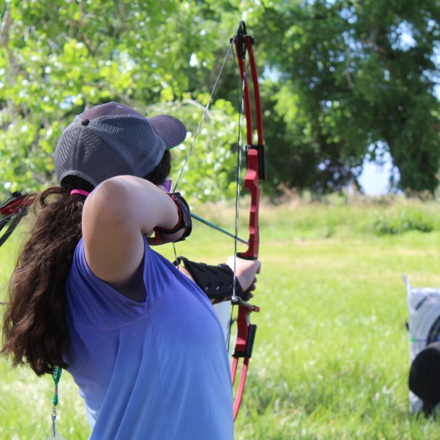 Girl shooting an arrow