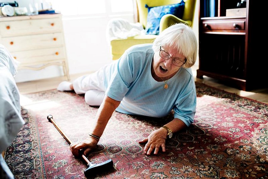 Elder women on the ground after a fall