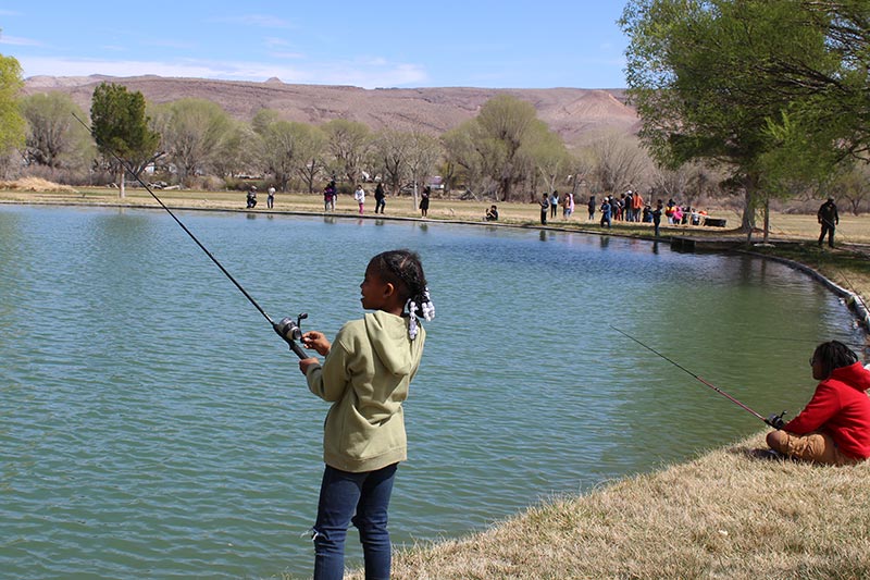 youth fishing a alamo pond