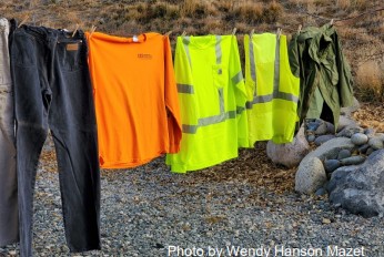 Work clothes hang on a line