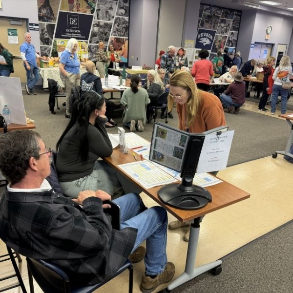Volunteers connecting at end of year meeting