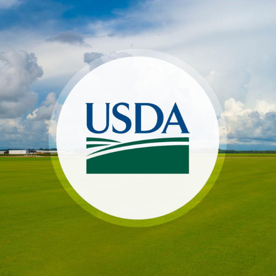 USDA logo with farm in background