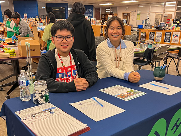 2.	4-H members greet attendees at the 4-H Family Engagement Night 