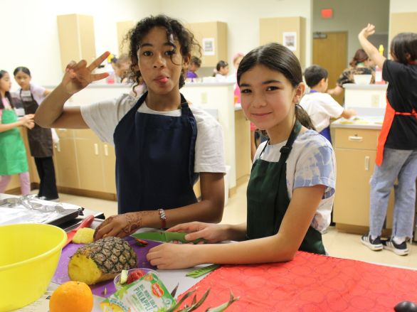 Two girls cooking