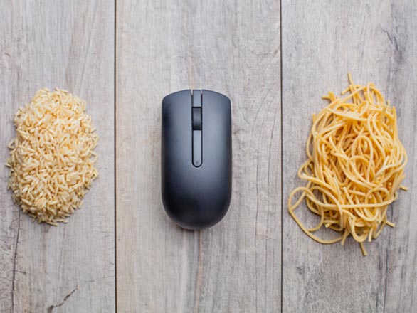 pile of rice next to computer mouse