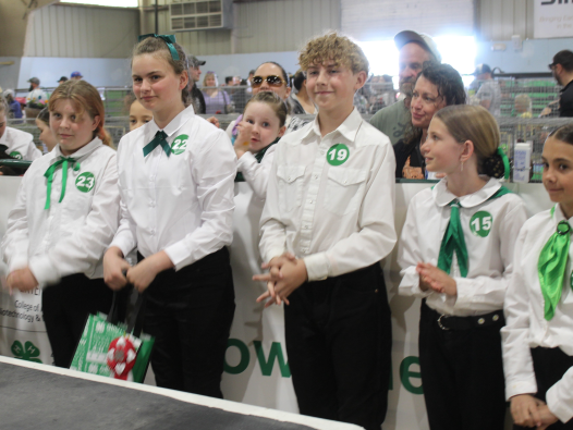 4-H kids smiling at a small animal contest