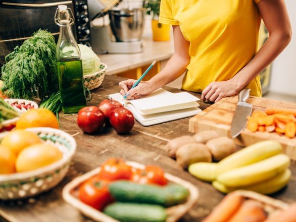 Woman cooking a healthy meal.