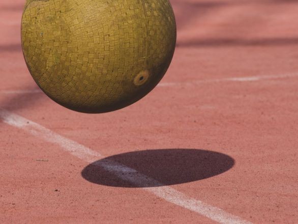 close up of a ball about to bounce off the ground