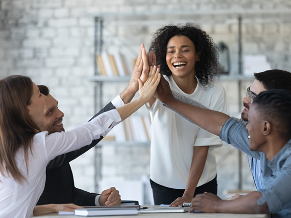 group of people high-fiving