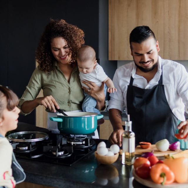 A family cooking together.