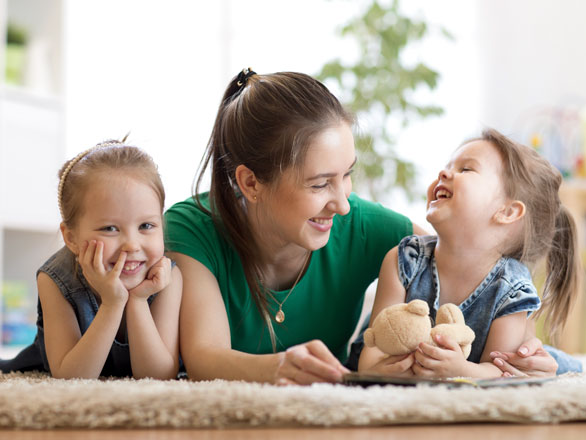 mother reading to kids