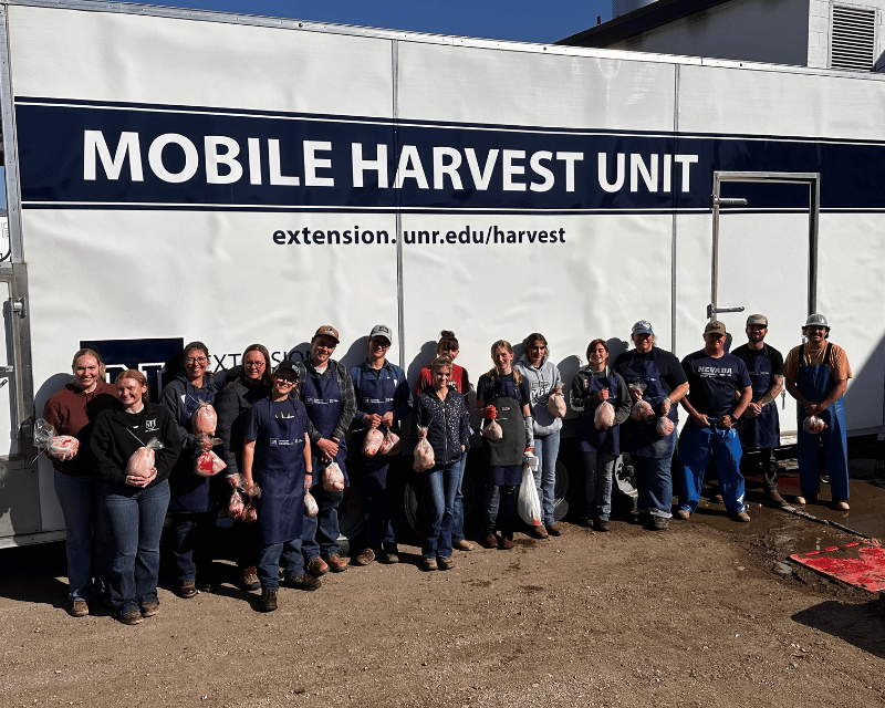 Workforce Meat Team in front of Mobile Harvest Unit with 4H Program